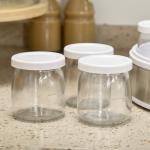 Iogurteira 20W Capacidade 1,26L com 7 Frascos de Cristal de 180 ml Termóstato Ajustável Temporizador de 1 - 48 horas 24x24x13 cm Branco