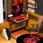 Secretária Gaming com Luzes LED 100x60 cm Tomadas de Corrente Suporte para Monitor Prateleiras e Comando Remoto Preto