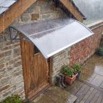 Marquise de Proteção 110x60cm Marquise Exterior para Portas e Janelas contra o Sol e Chuva com Suporte de PP Policarbonato Cinza